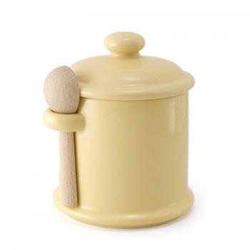 ceramic canister with wooden spoon